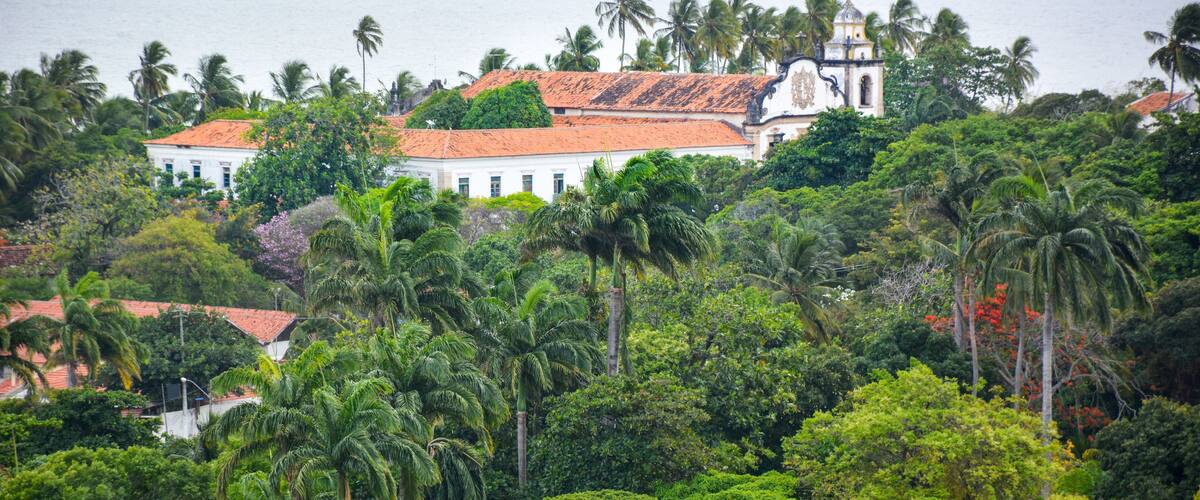 The historic architecture of Olinda in Pernambuco, Brazil with its colonial buildings and cobblestone streets at sunset.
