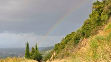Rainbow coming down the mountain road from Mirtias/Thermo.