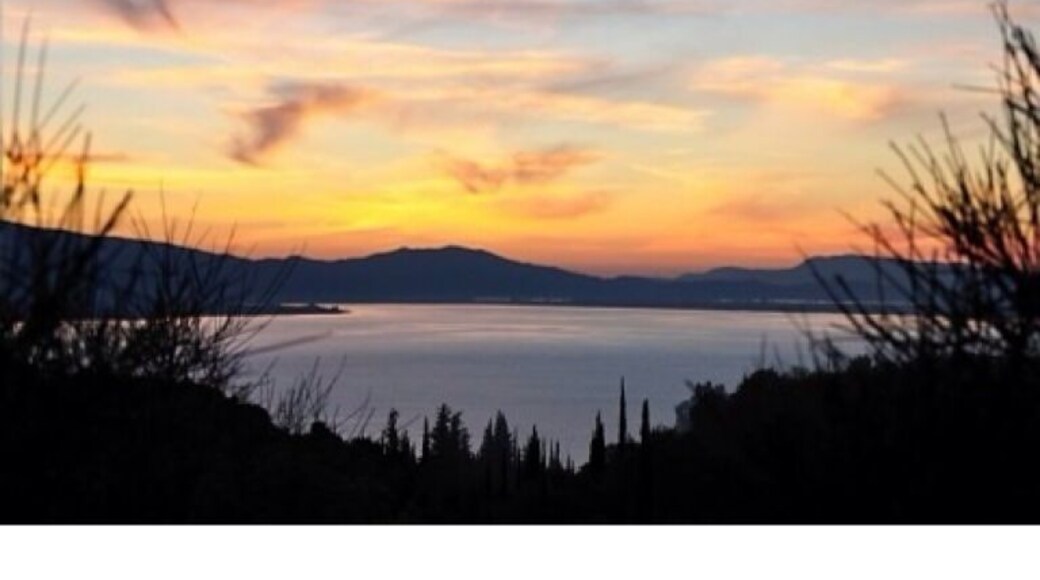 Sunset over Limni Trichonida between Agia Sofia and Mirtias.