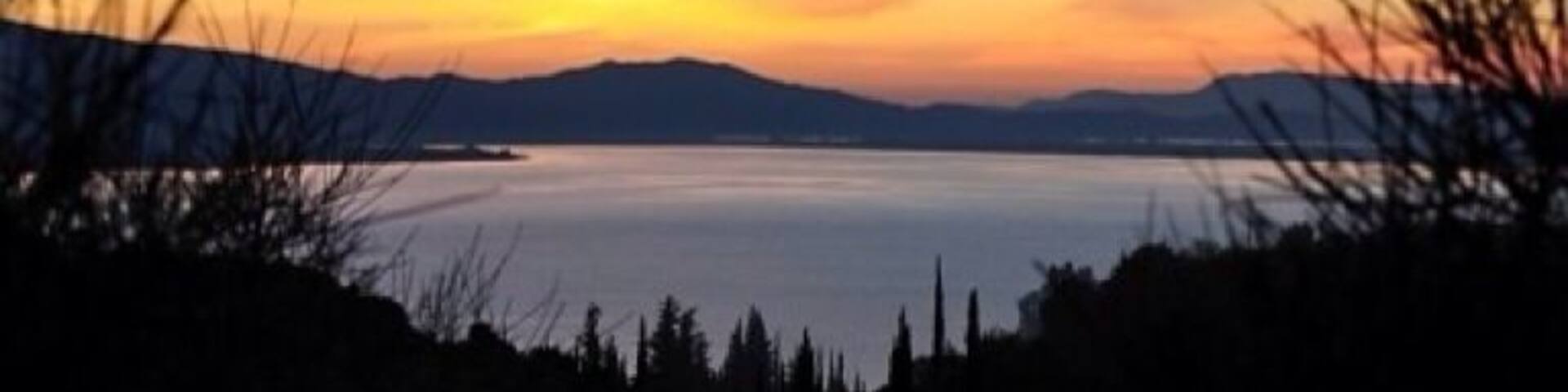 Sunset over Limni Trichonida between Agia Sofia and Mirtias.