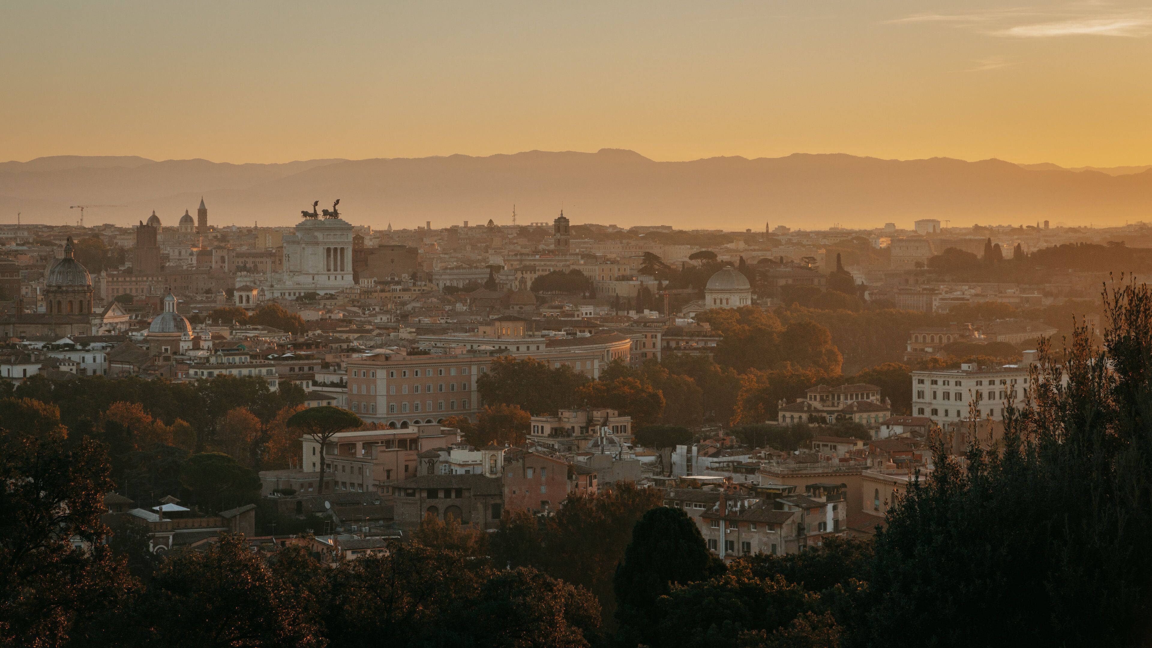 Janiculum Hill which includes a city, landscape views and a sunset