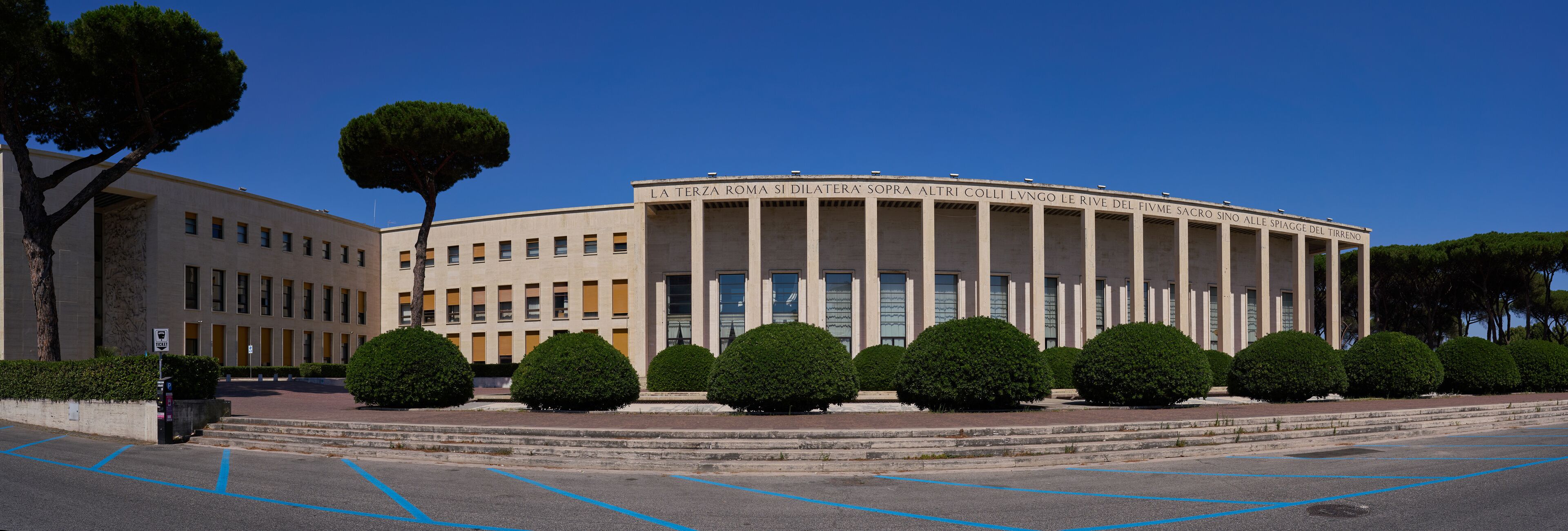 Panoramic view of Palazzo degli Uffici (offices palace) and piazzale delle fontane at EUR in Rome, example of the rationalist architecture of the first half of the 20th century