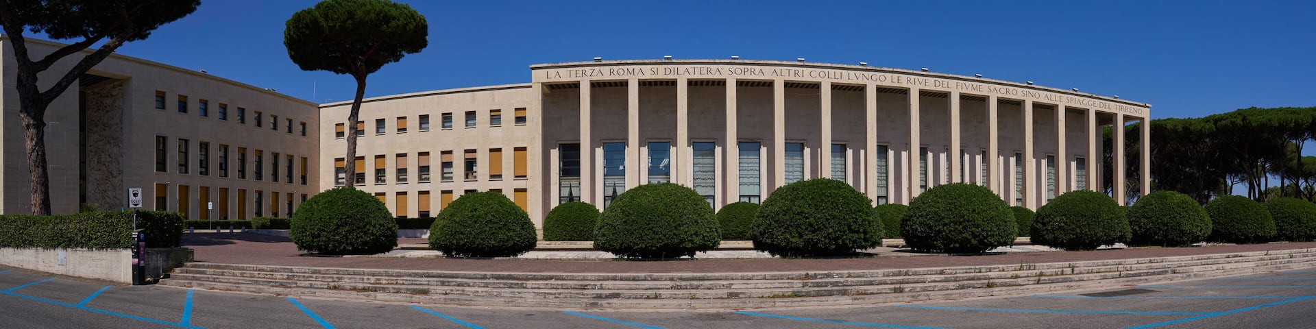 Panoramic view of Palazzo degli Uffici (offices palace) and piazzale delle fontane at EUR in Rome, example of the rationalist architecture of the first half of the 20th century