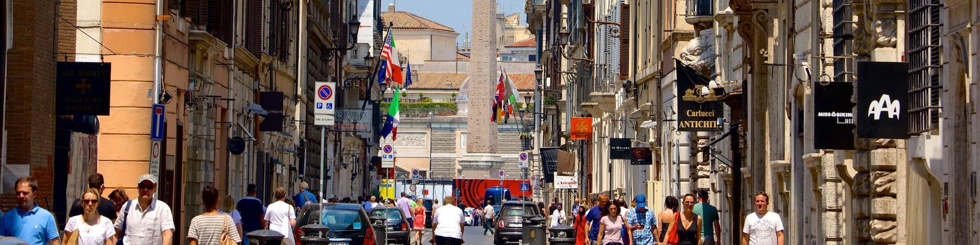 Via del Babuino showing a city, street scenes and religious aspects