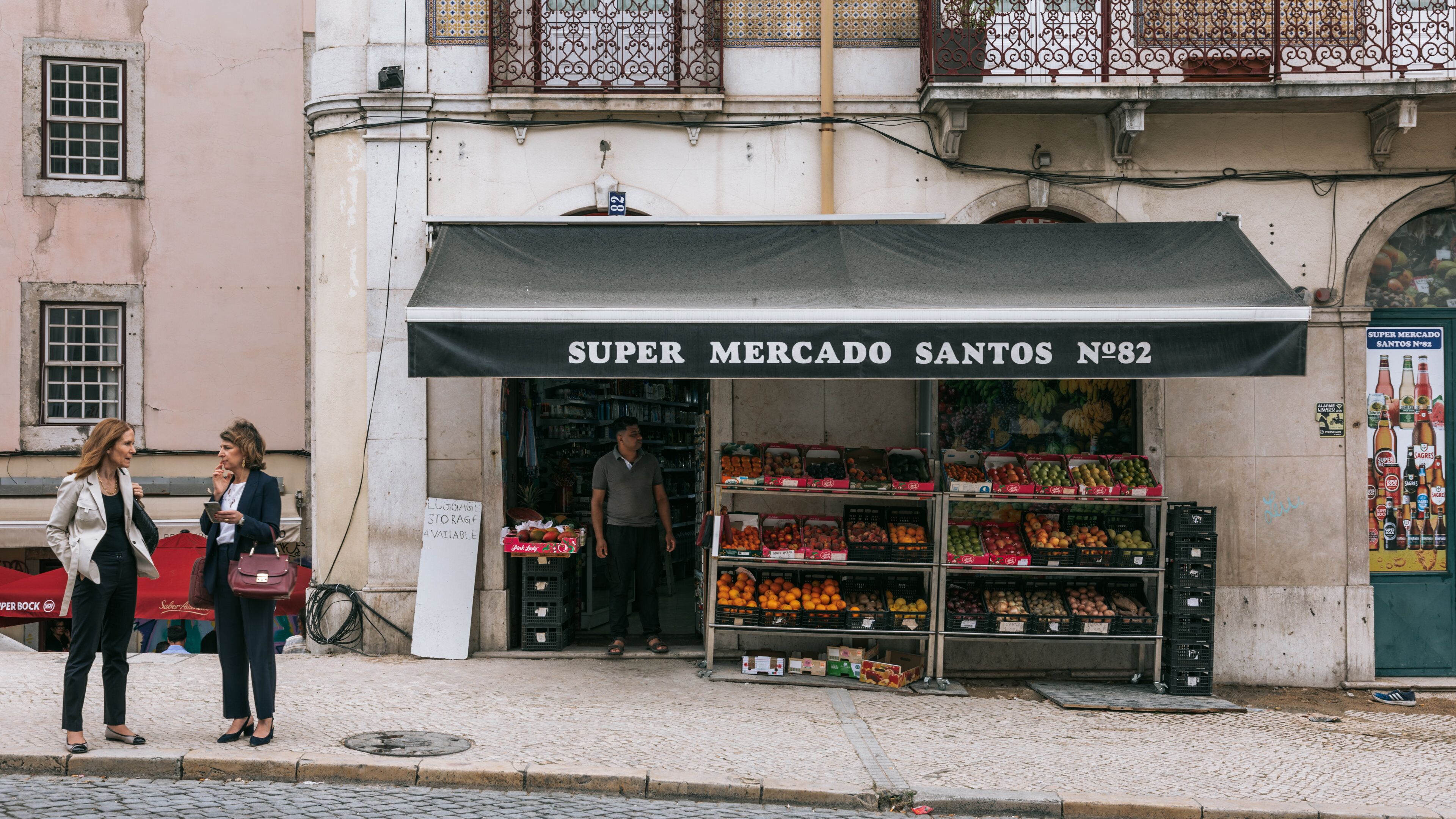 Santos featuring street scenes and signage as well as a couple