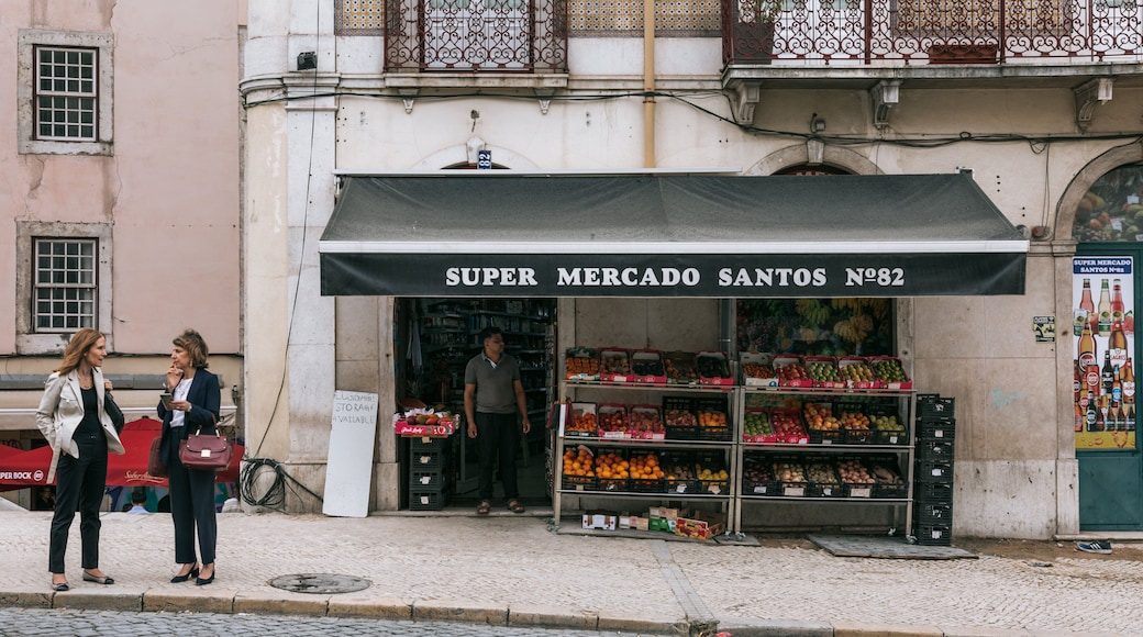 Santos featuring street scenes and signage as well as a couple