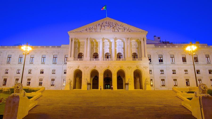 Parliament featuring an administrative building, a city and night scenes