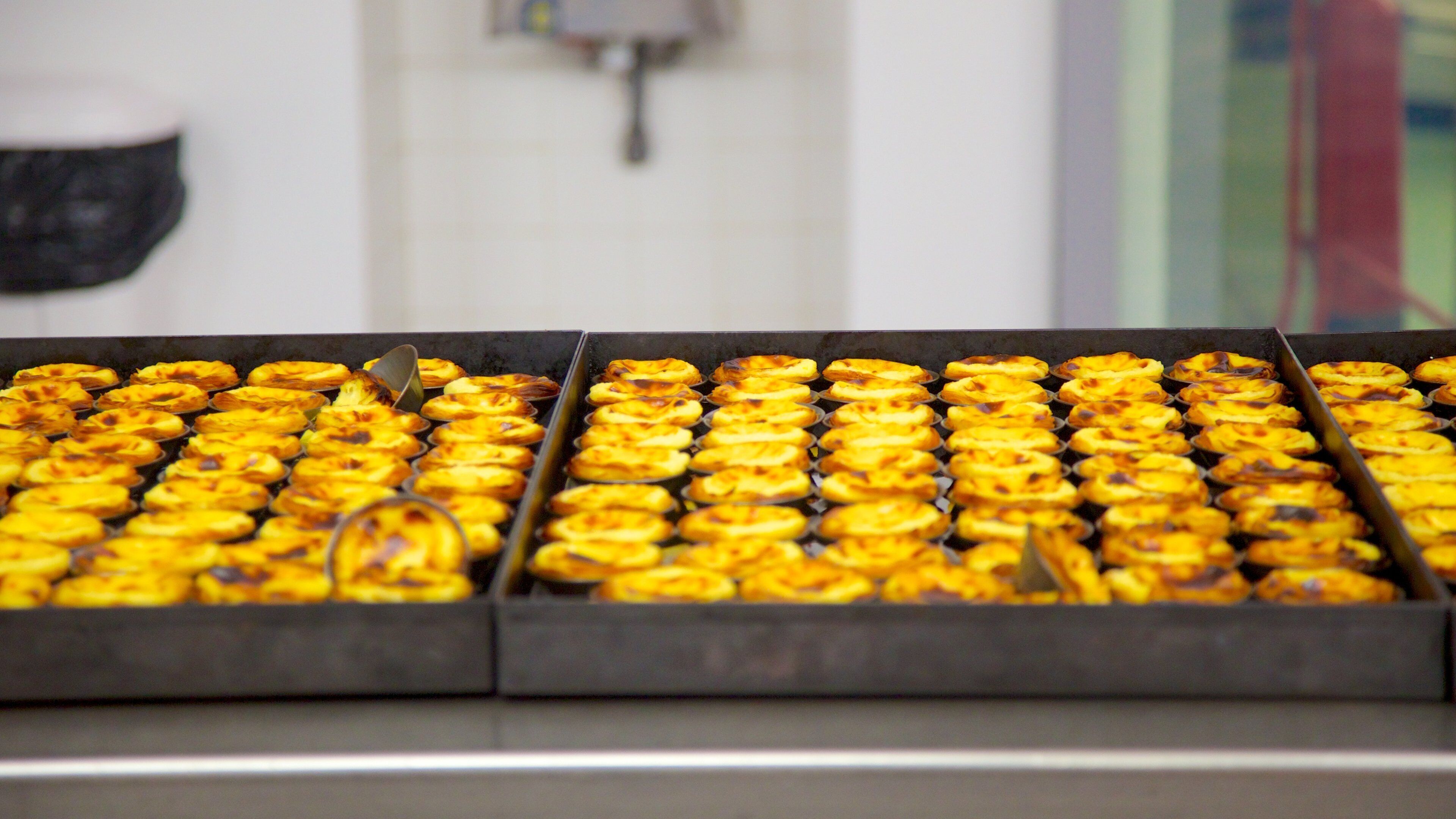 Pastéis de Belém which includes interior views and food