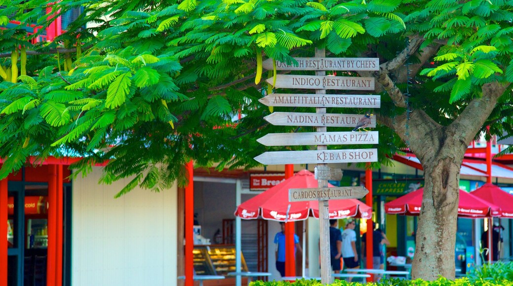 Port Denarau showing street scenes and a city