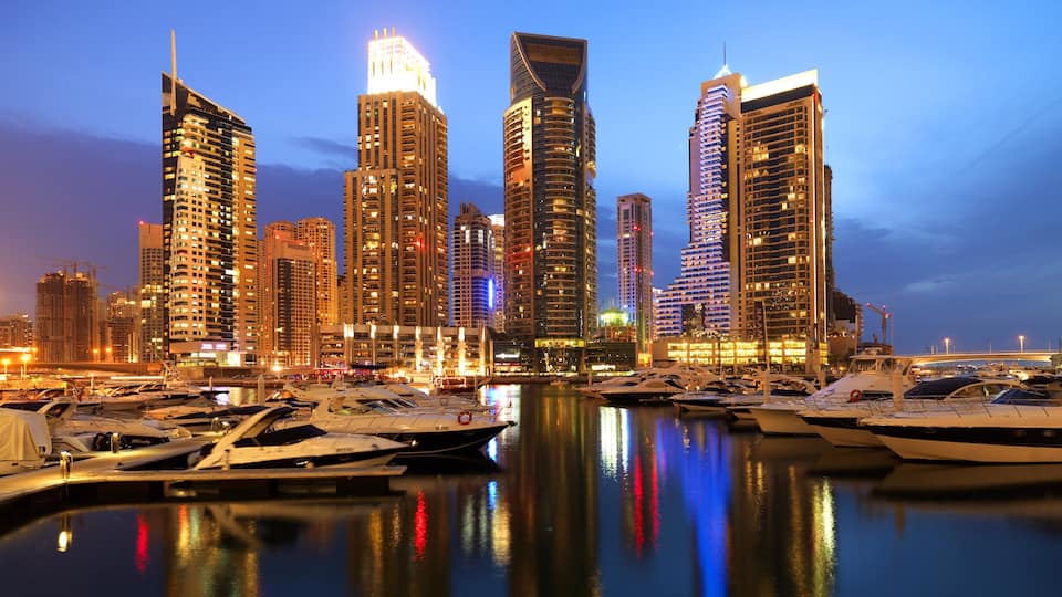 Dubai Marina featuring city views, a marina and boating