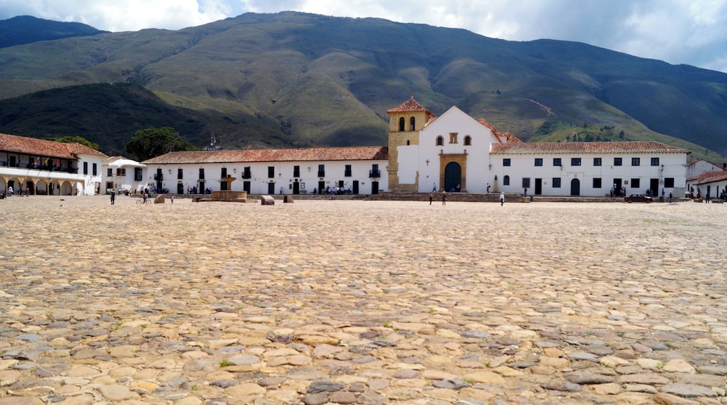 The picturesque village of Villa de Leyva is a 3-hour drive away from Bogota. Villa de Leyva has beautiful colonial architecture and one of the largest town squares I've ever seen. It high up in the Andean mountains, so the climate is quite pleasant. There are good hiking options around and even dinosaur fossils to look at.