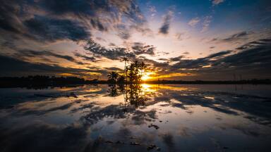Malaysia, Penang Island, Juru, Kepala Batas, Penaga, Sunset reflecting in water