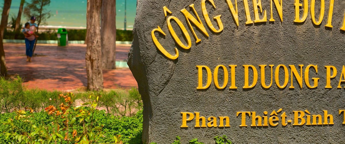 Phan Thiet Beach which includes signage