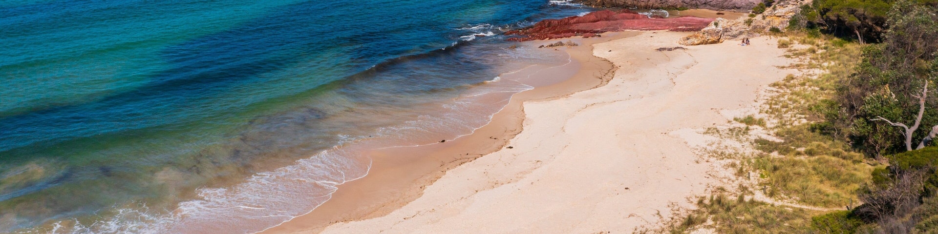 Pambula Beach which includes general coastal views and a sandy beach