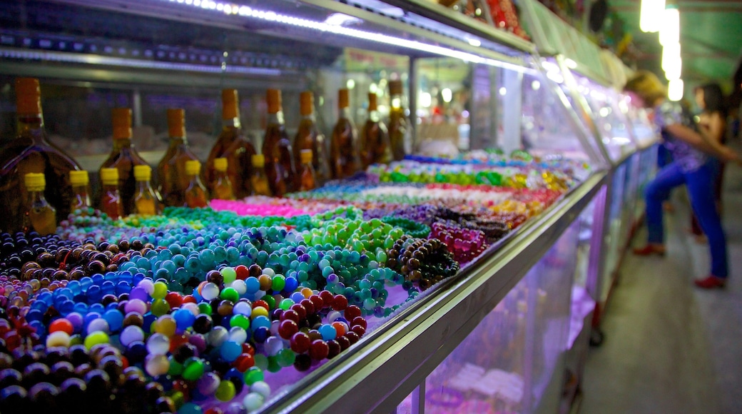 Dinh Cau featuring drinks or beverages, markets and interior views