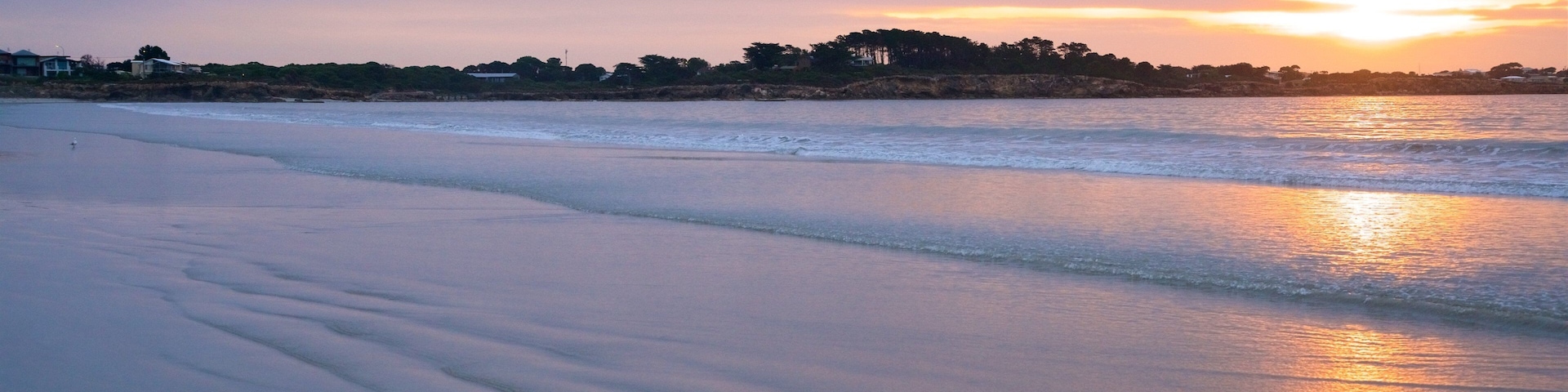 Long Beach featuring general coastal views, a sandy beach and a sunset