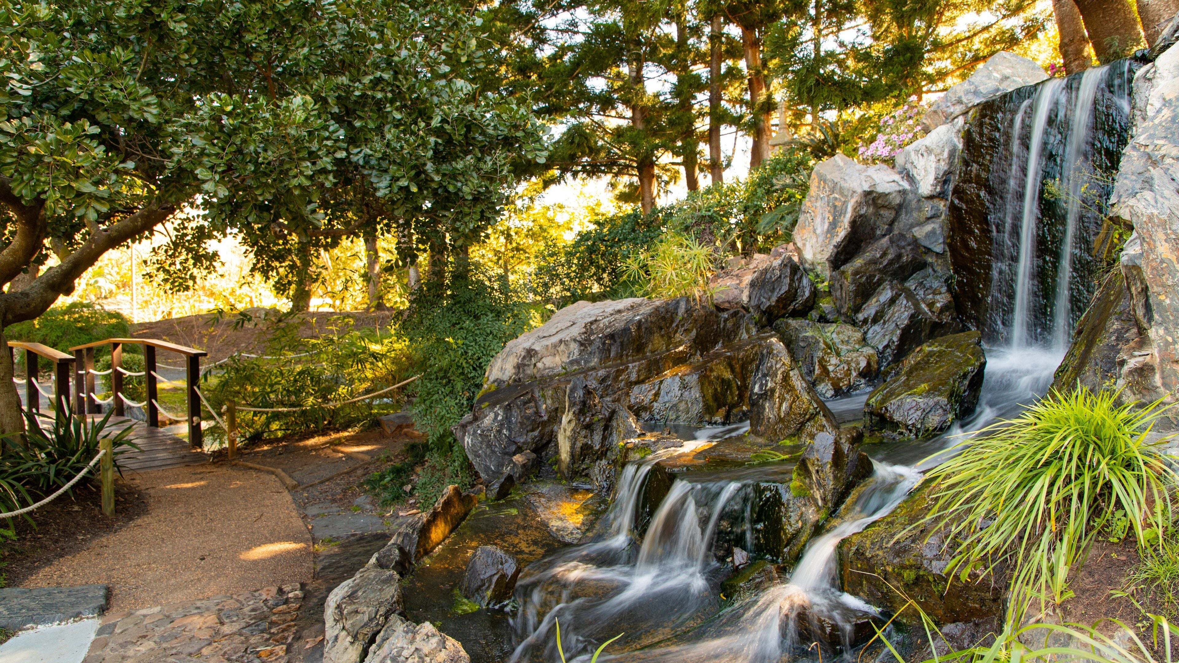 Rockhampton Botanic Gardens and Zoo featuring a park and a river or creek