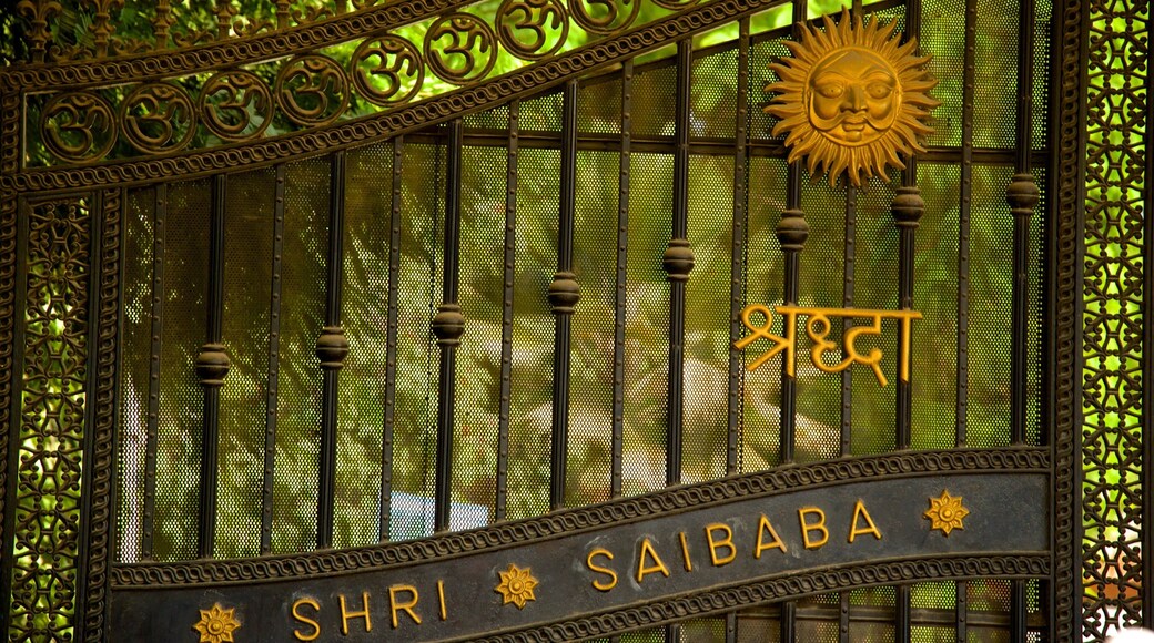 Sai Baba Temple which includes signage and a garden