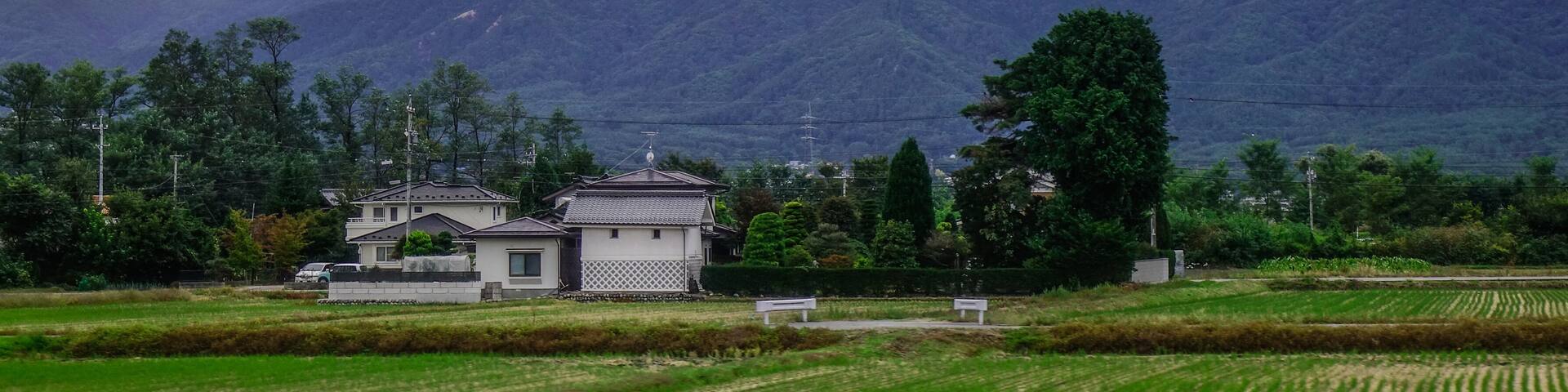 Mountain township in misty day