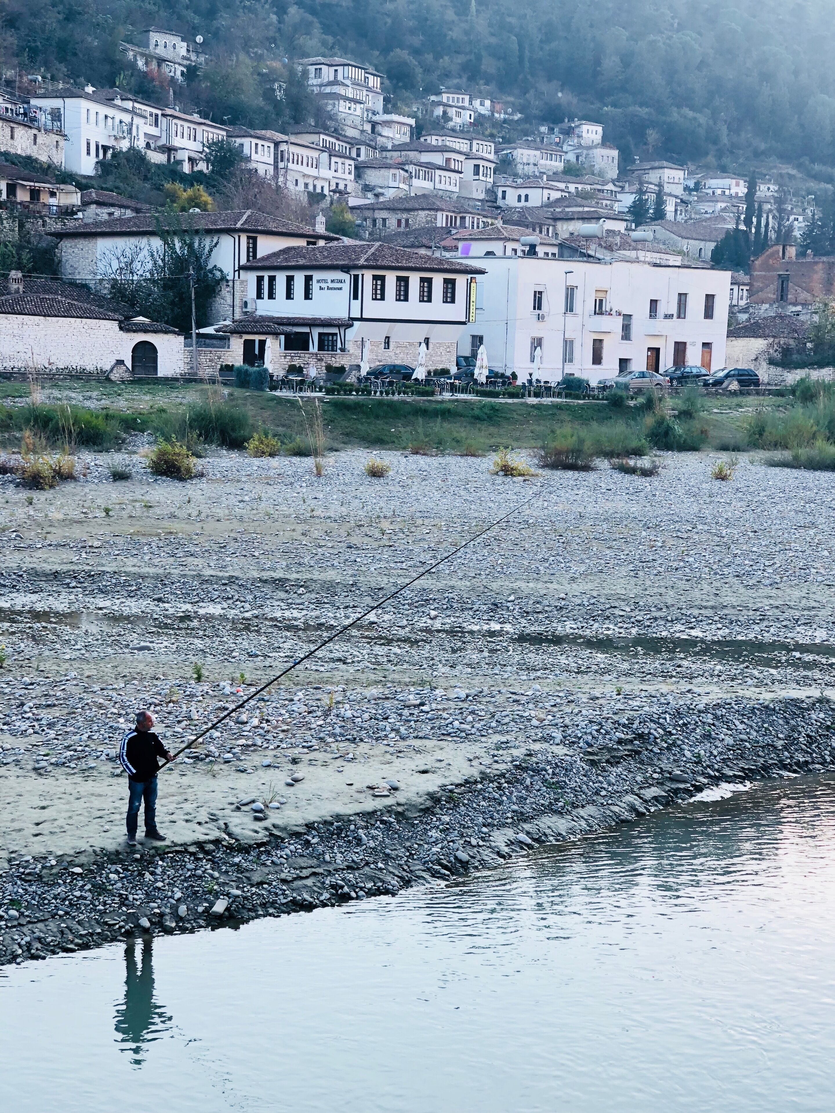 Fishing near the stream in Berat 