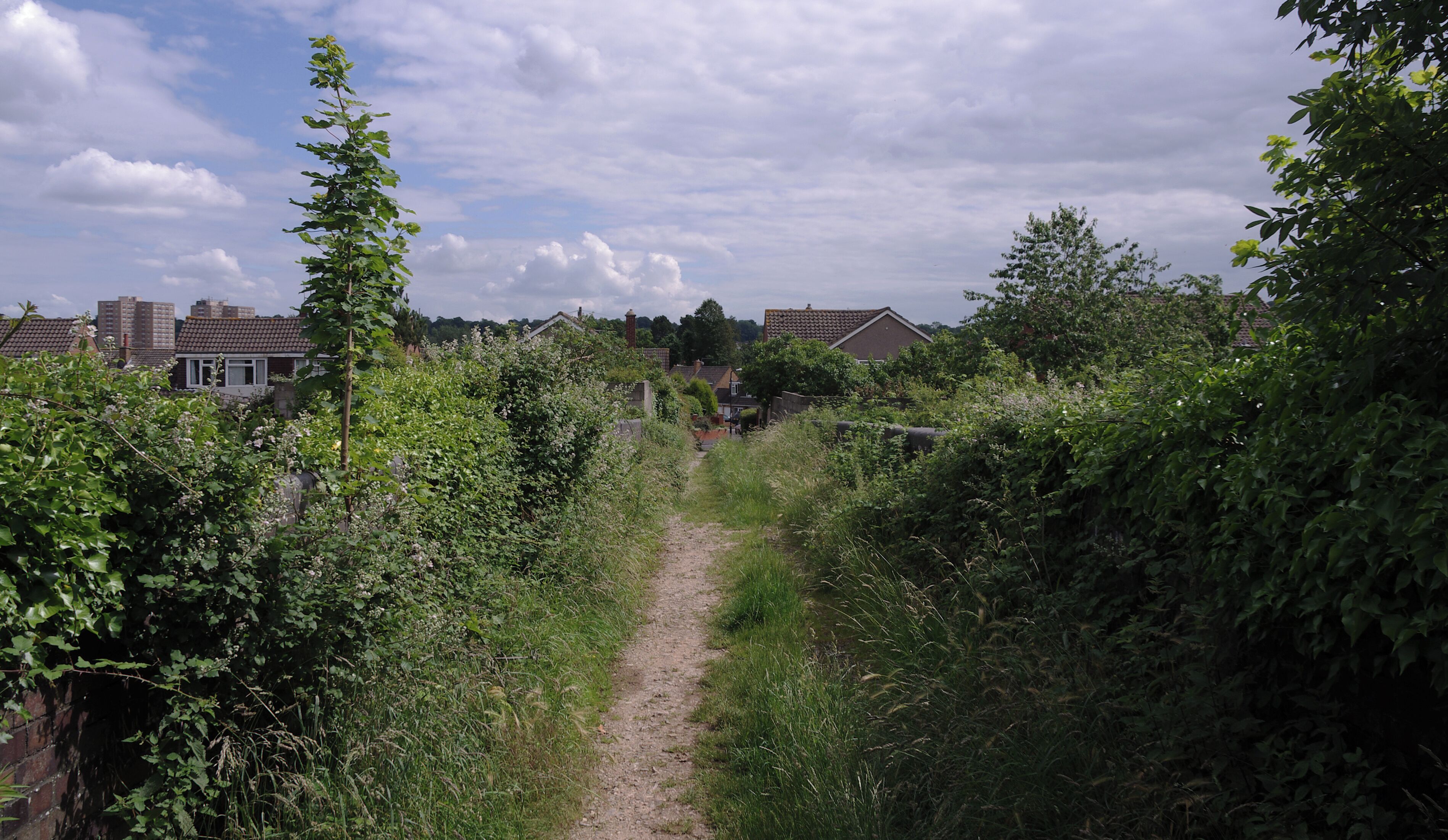 View south along a footbridge over the Filton to Avonmouth (Henbury Loop) Line at Henbury.