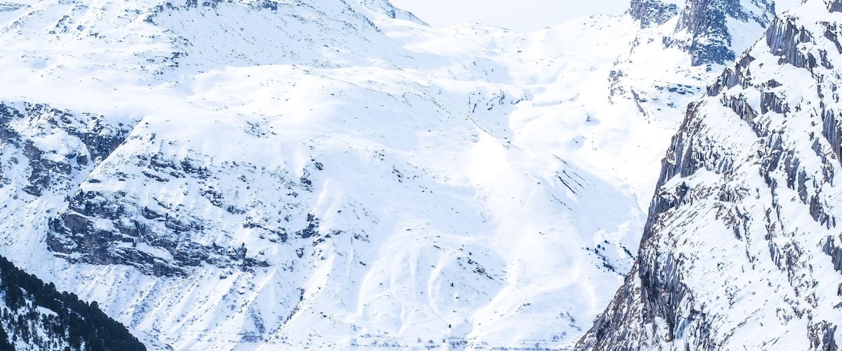 The 2h winter hike from Vals to Zervreila is well worth the view ! 
Start with the gondola ride from Vals to Gadastatt, then hike to Zervreila where you can rent sleds to get back down back to Vals in no time !