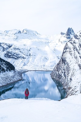 The 2h winter hike from Vals to Zervreila is well worth the view ! 
Start with the gondola ride from Vals to Gadastatt, then hike to Zervreila where you can rent sleds to get back down back to Vals in no time !