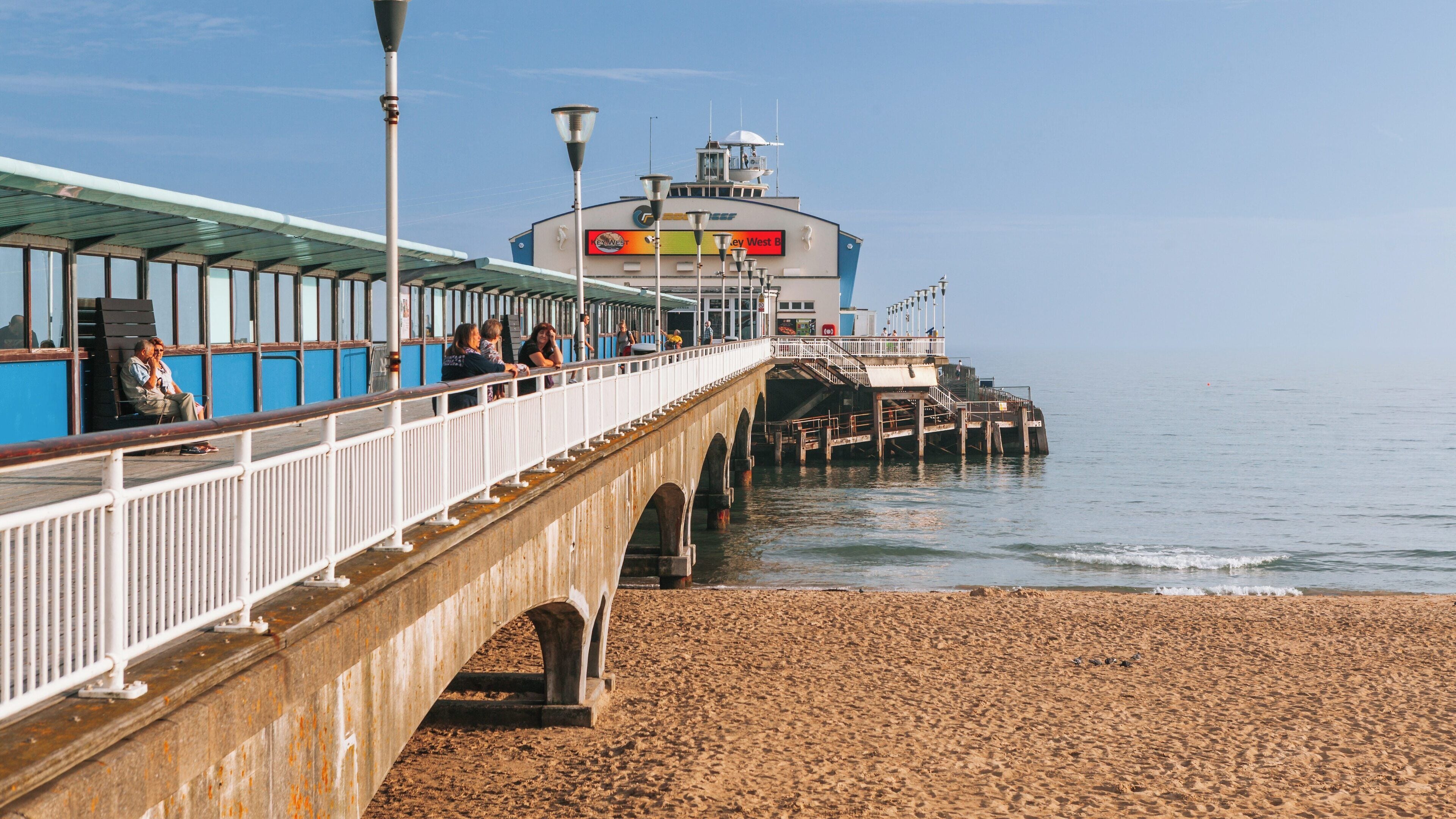 Bournemouth Pier offers scenic views and relaxation by the beach in Bournemouth City Centre on a sunny day in England