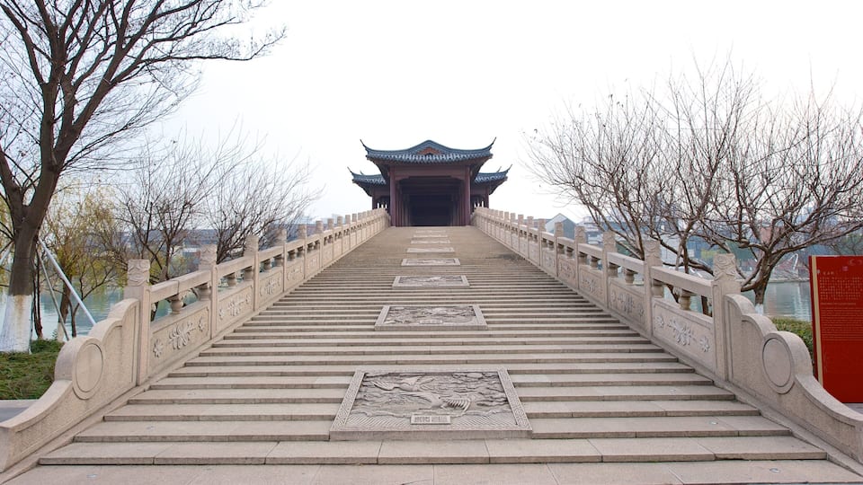 Jinji Lake which includes a temple or place of worship and heritage architecture