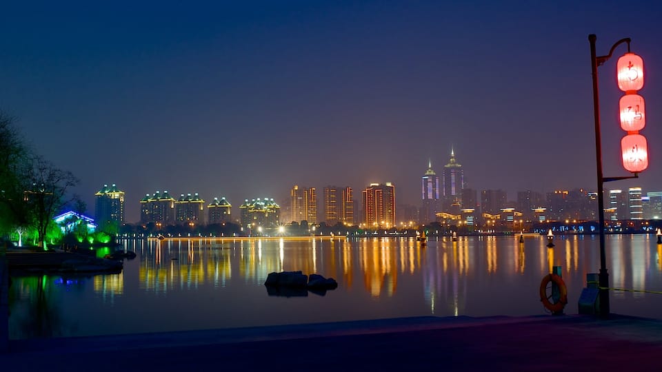 Jinji Lake showing a city, a river or creek and night scenes