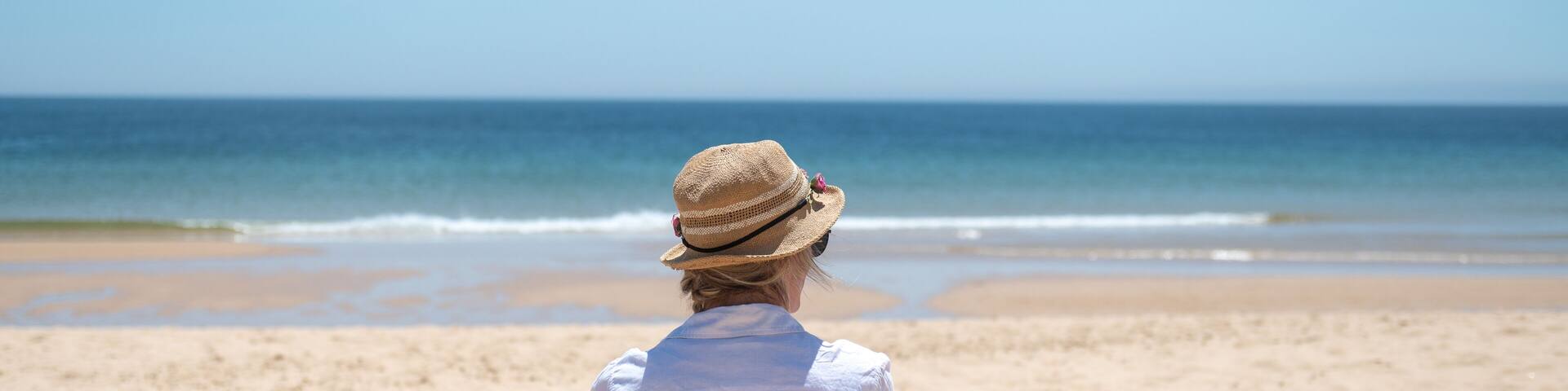 Blonde woman in the Algarve, Portugal in the summer of 2022.