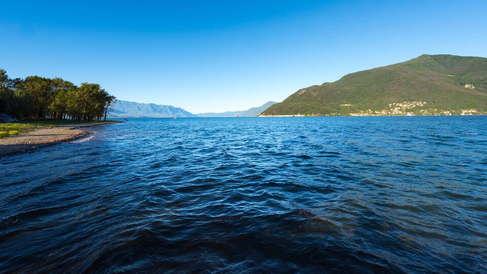 View from Maccagno beach to the southern part of Lake Maggiore - Maccagno, Lake Maggiore, Varese, Lombardy, Italy