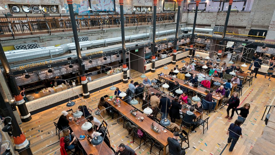 The Mackie Mayor food and drink hall located on Swan Street in the Northern Quarter area of Manchester, UK.