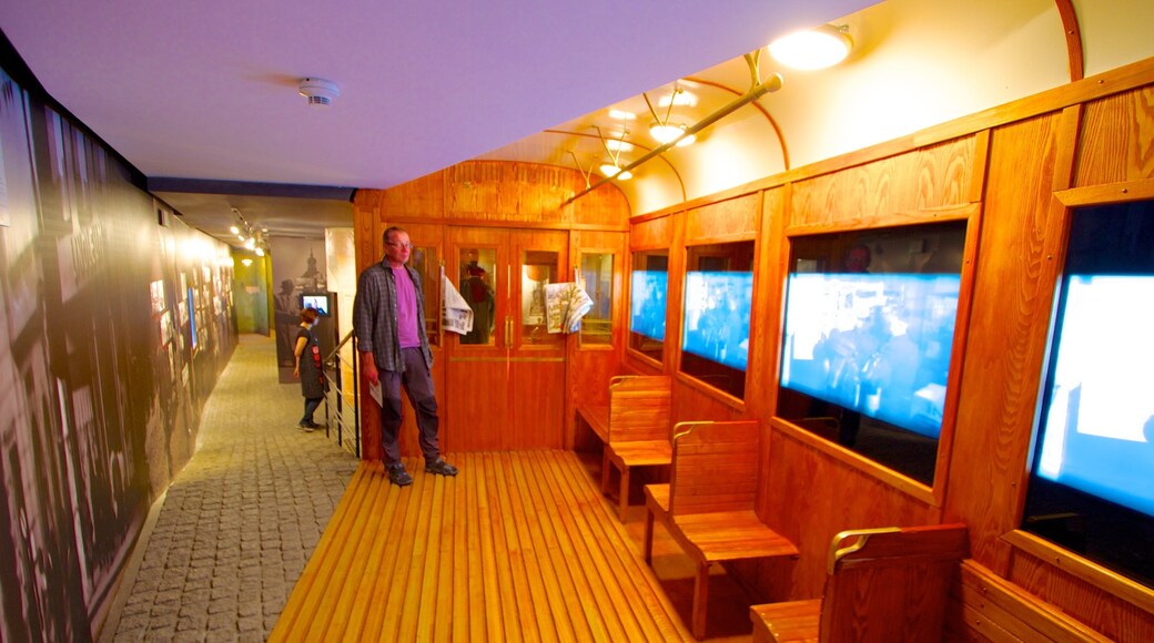 Oskar Schindler Factory which includes interior views as well as an individual male