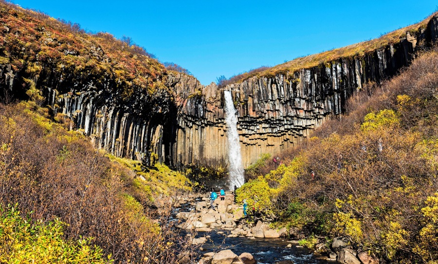 It's worth to walk about an hour to reach this waterfall in the south part of Iceland as  the autumn scene here is so stunting.