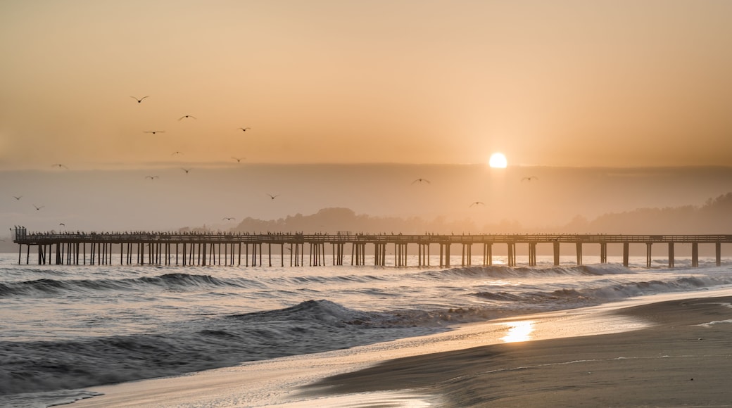 Hazy Sunset over Seacliff State Beach. Aptos, Santa Cruz County, California USA.
