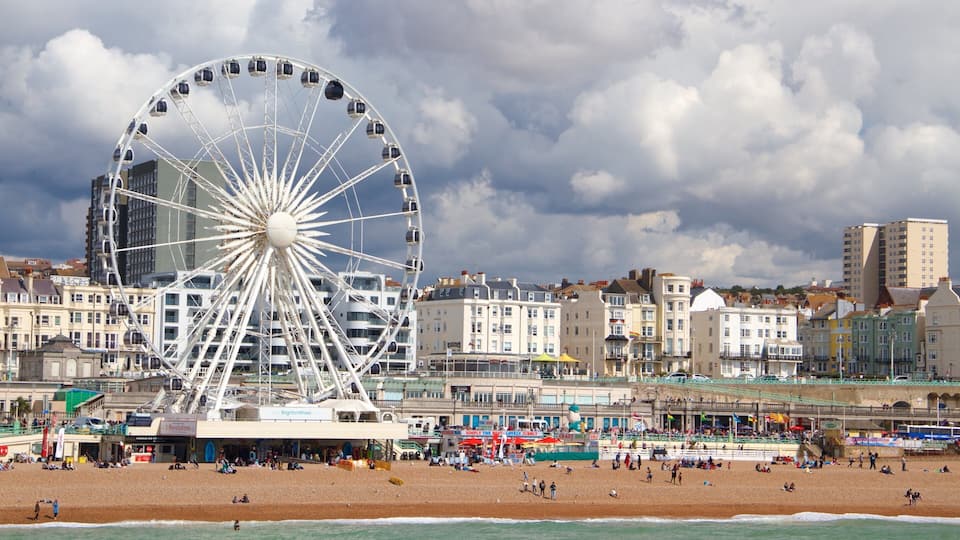 Brighton Wheel featuring a sandy beach, a city and general coastal views