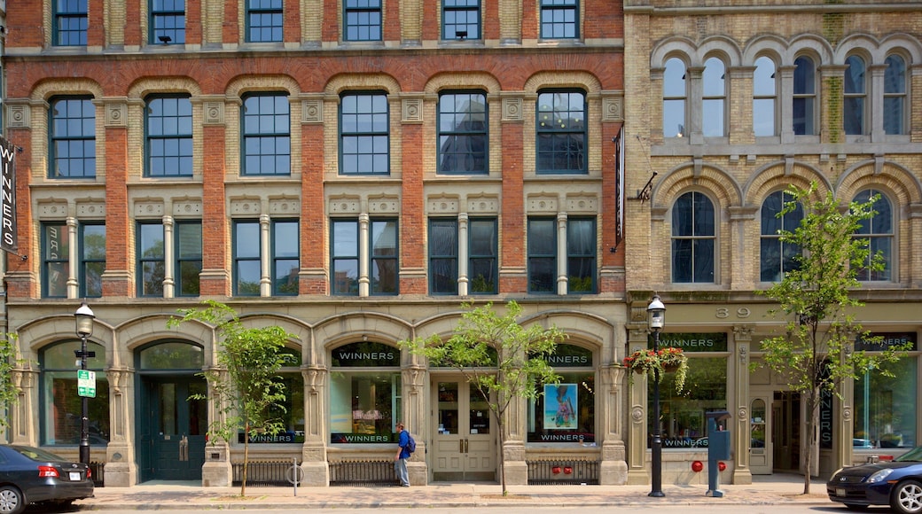 Old Town showing a city as well as an individual male