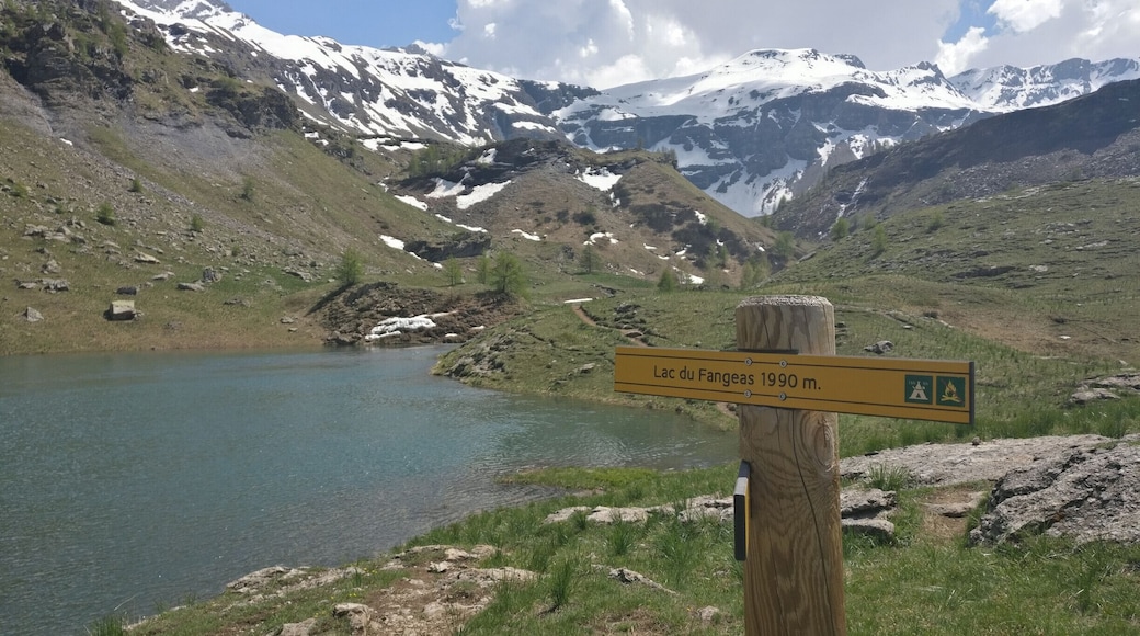 Fangeas lake, at the end of the Dormillouse valley, is a short hike up from Dormillouse town. Surrounded by snow until June, this is one beautiful emerald lake in the Alps. #TakeAHike
