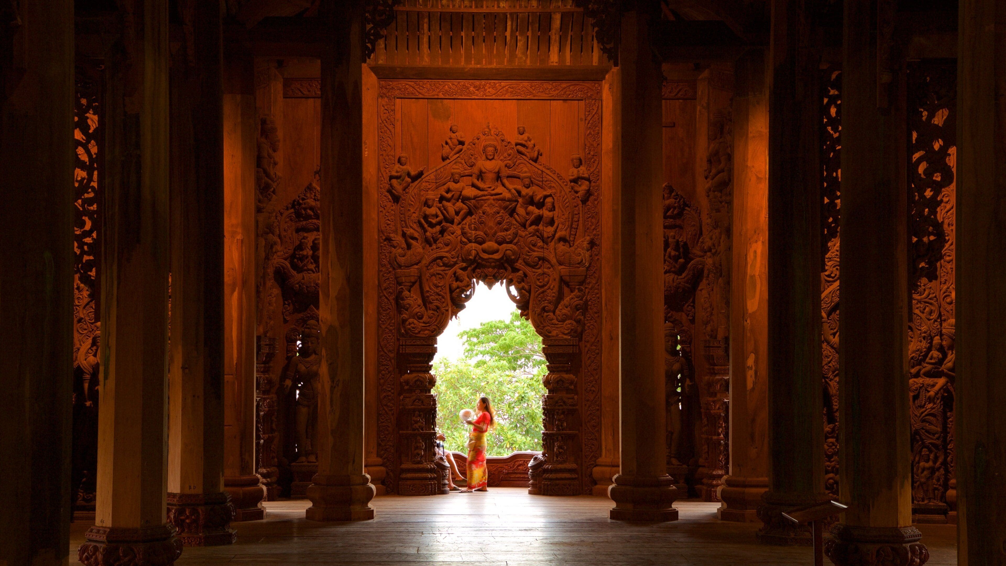 Sanctuary of Truth showing a temple or place of worship and interior views as well as an individual femail