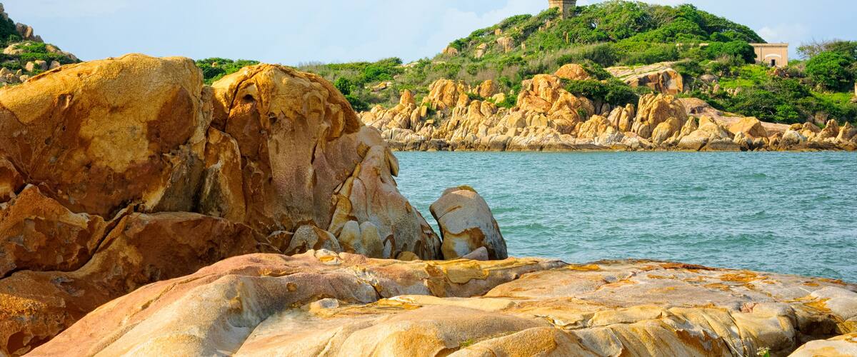 Ke Ga Lighthouse in early morning sunshine, oldest lighthouse of Vietnam. Binh Thuan province, Vietnam