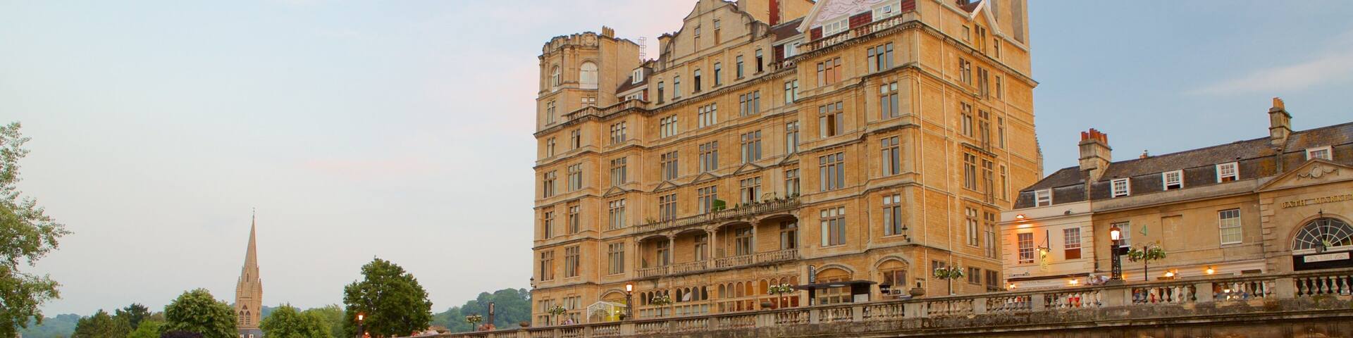 A historic building with a river in front.