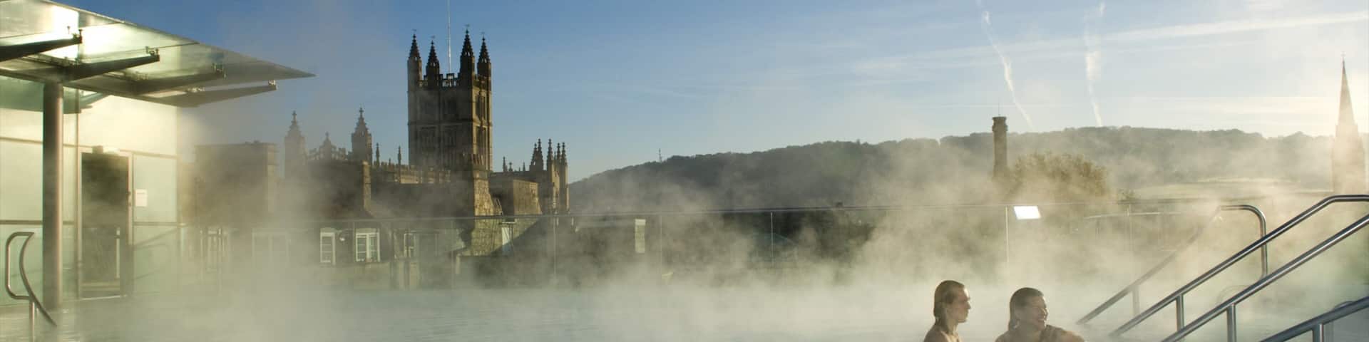 Thermae Bath Spa which includes mist or fog, a pool and heritage architecture