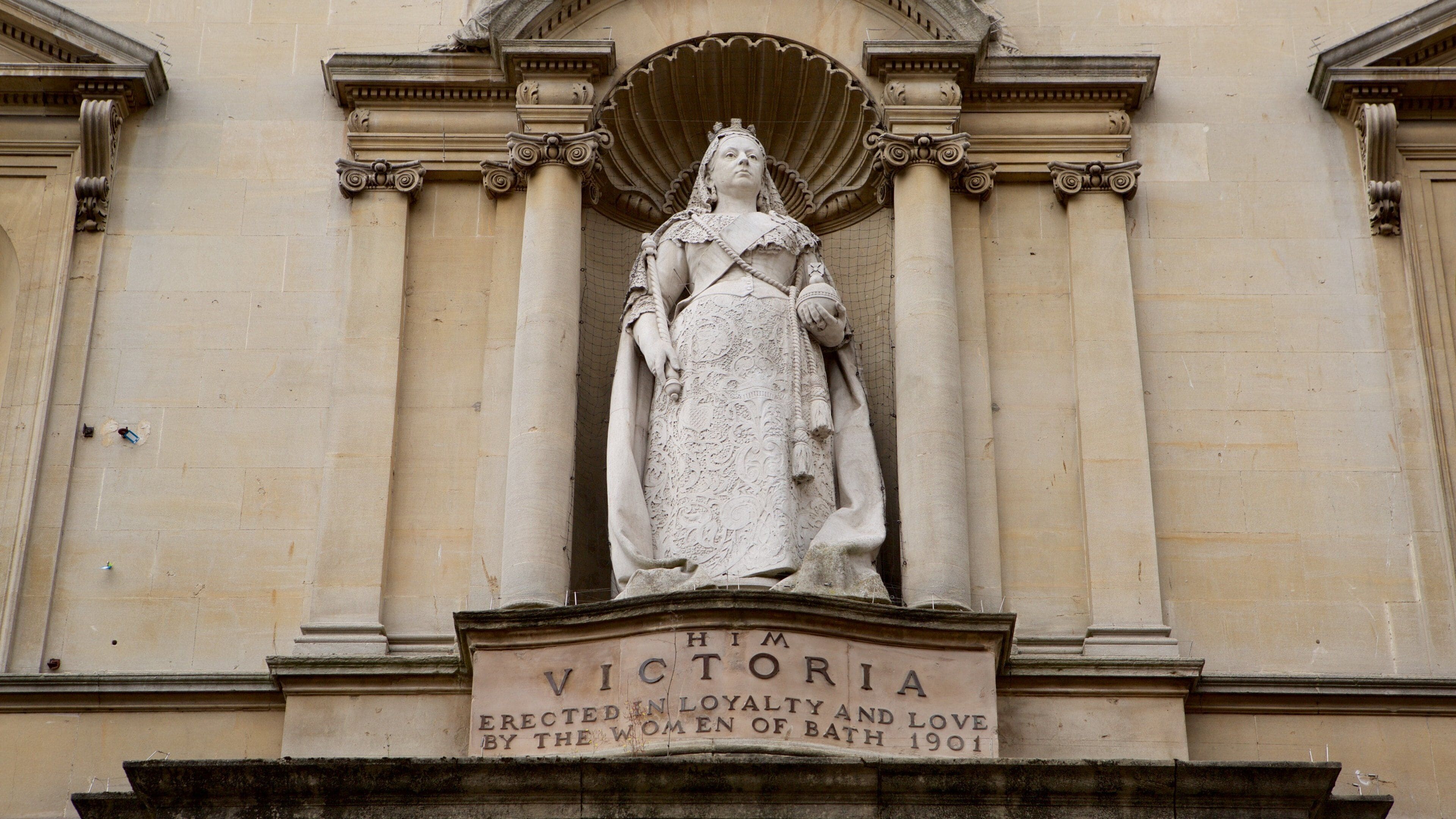 Victoria Art Gallery featuring heritage architecture, a statue or sculpture and signage