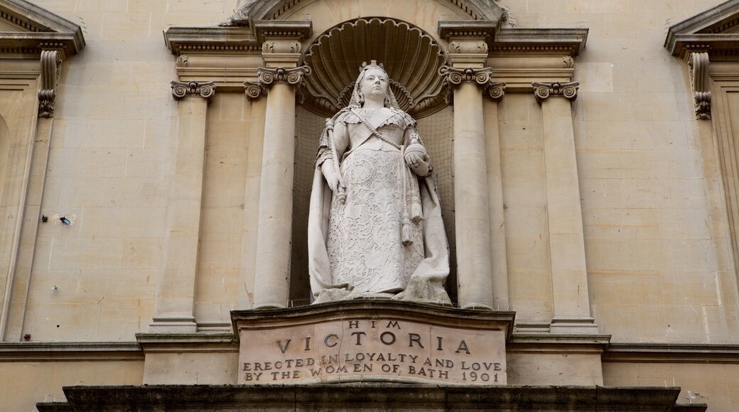 Victoria Art Gallery featuring heritage architecture, a statue or sculpture and signage