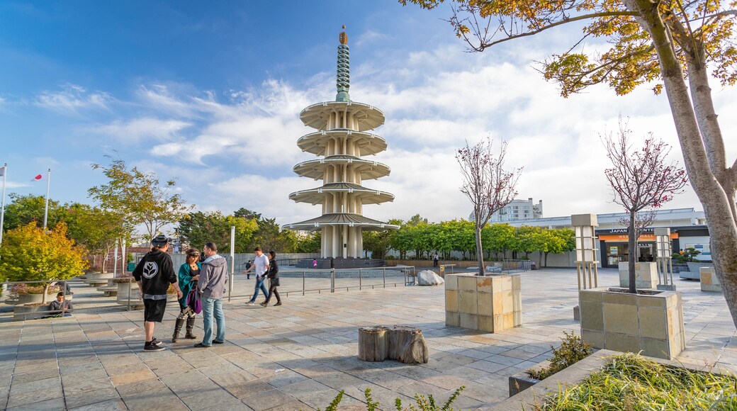 Japantown showing street scenes and a square or plaza as well as a small group of people