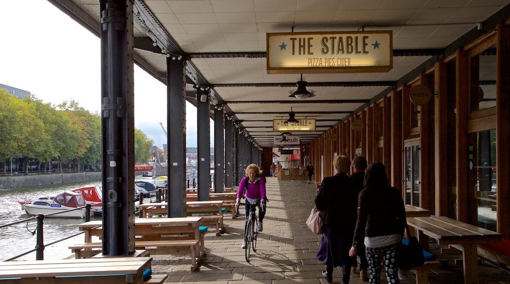 Watershed showing cycling and signage as well as an individual female