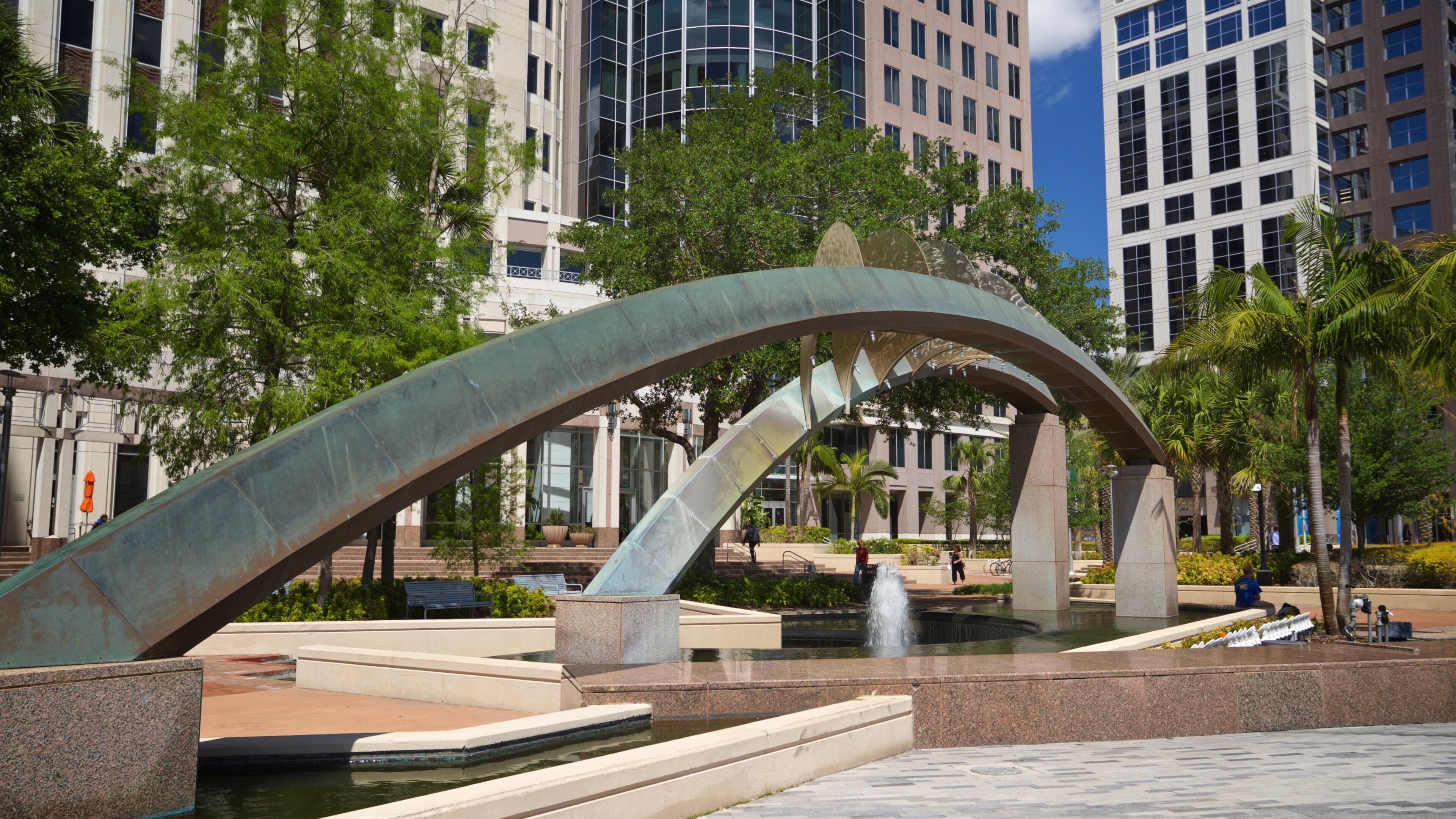 Orlando City Hall featuring a city, outdoor art and a fountain