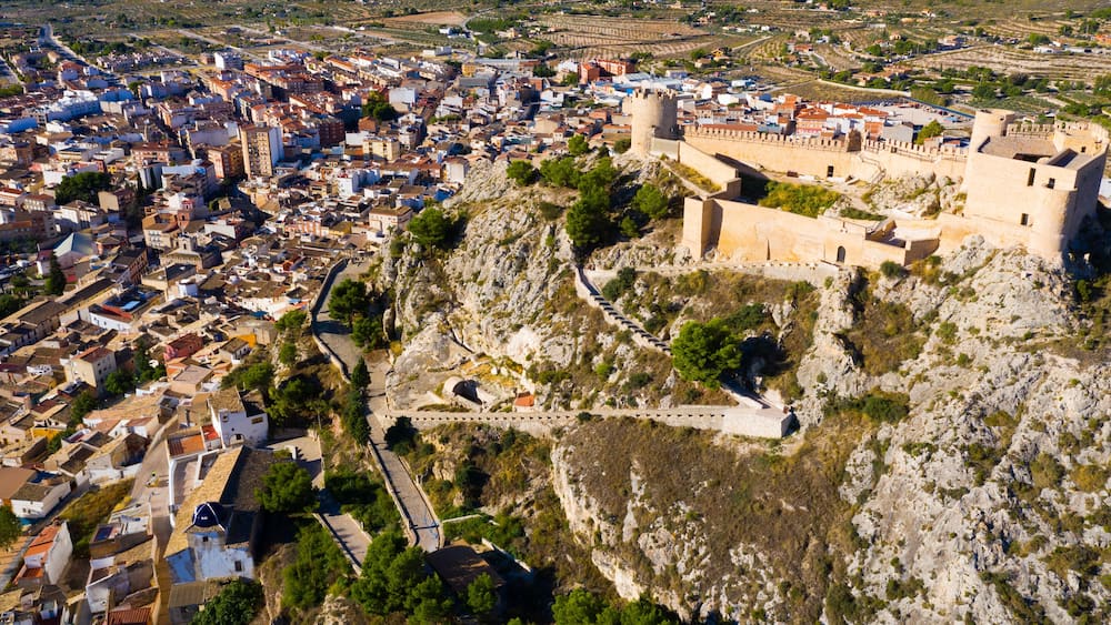Scenic aerial view of Spanish city of Castalla with old castle Castillo de Castalla