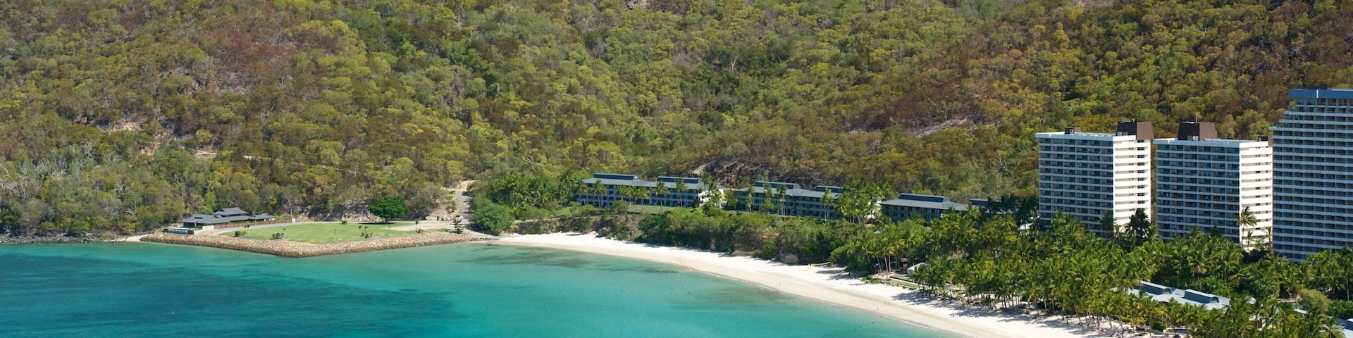 Catseye Beach which includes general coastal views and a coastal town